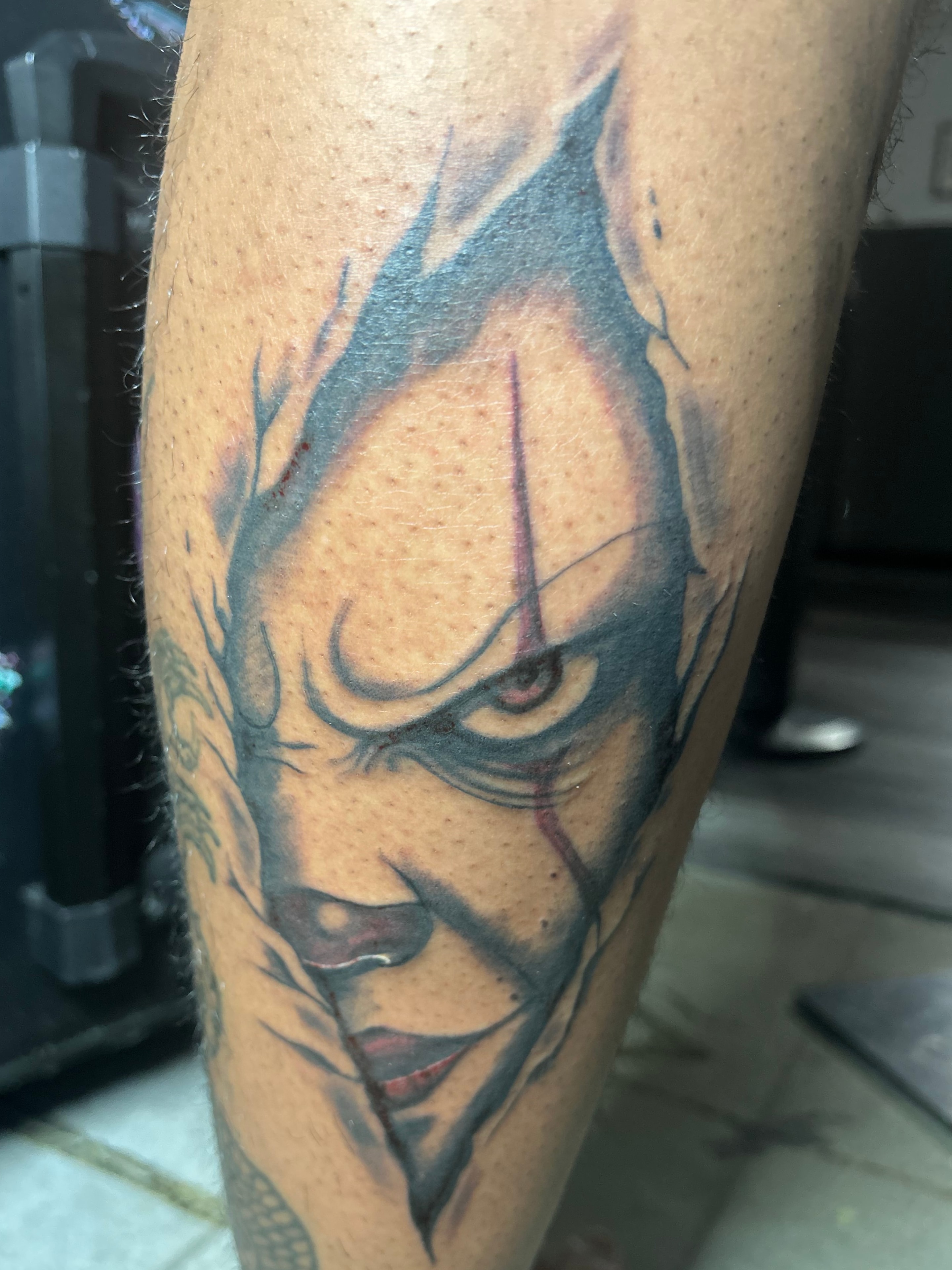 Floral tattoo on dark skin